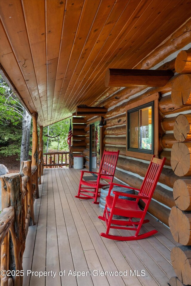 2134 Lower River Rd, Snowmass, CO 81654 - wooden deck with covered porch