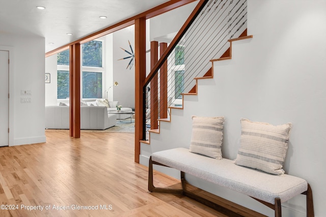 interior space featuring hardwood / wood-style flooring and expansive windows