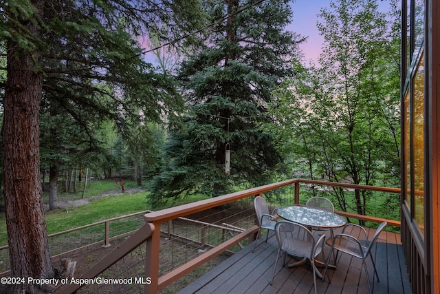 view of deck at dusk