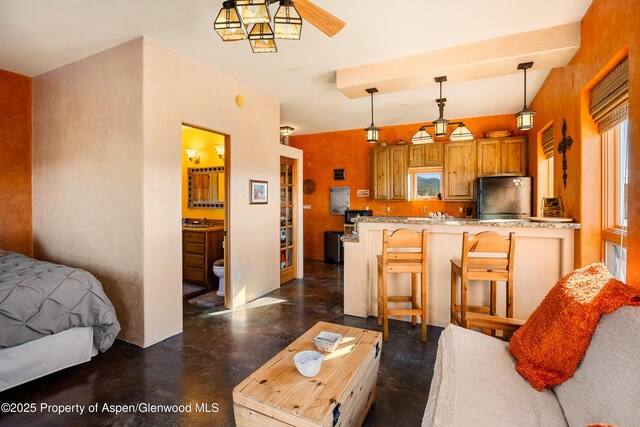 1212 County Road 238th Rd Unit 238, Silt, CO 81652 - living area with concrete floors