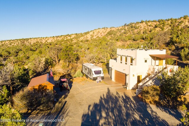 1212 County Road 238th Rd Unit 238, Silt, CO 81652 - view from above of property featuring a heavily wooded area