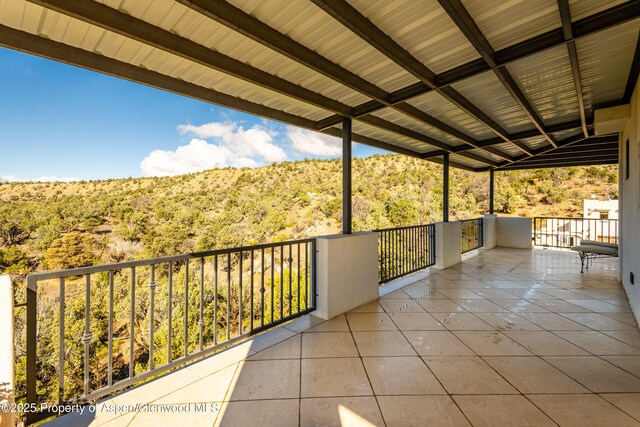 1212 County Road 238th Rd Unit 238, Silt, CO 81652 - balcony featuring a forest view