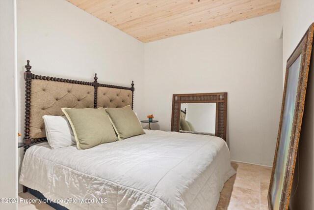 bedroom featuring wooden ceiling