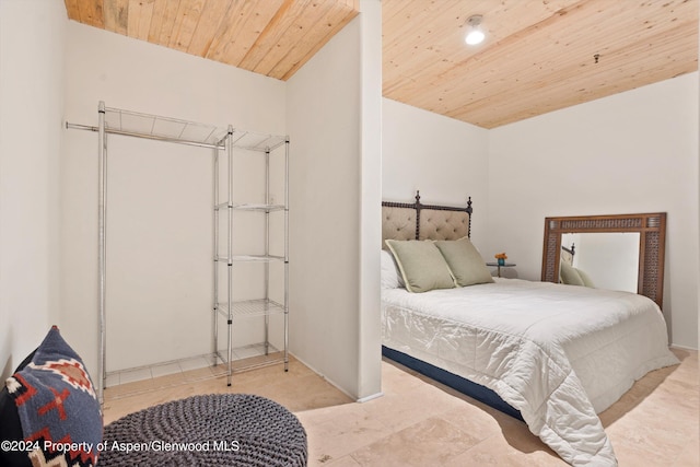 bedroom with wood ceiling