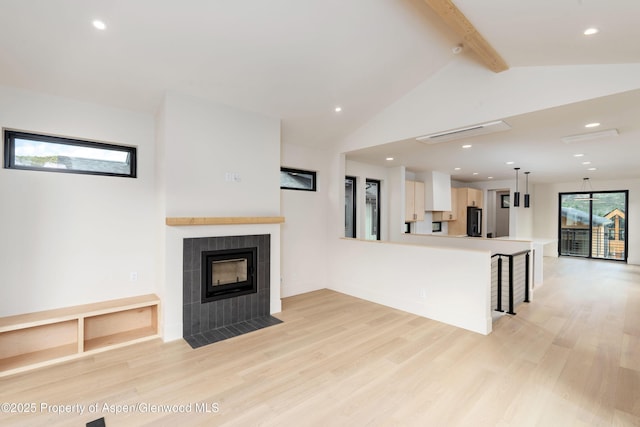366 Stotts Mill Rd, Basalt, CO 81621 - unfurnished living room with light wood-style floors, a fireplace, and recessed lighting