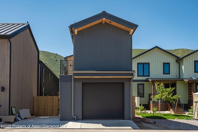 366 Stotts Mill Rd, Basalt, CO 81621 - contemporary home featuring an attached garage, driveway, and a mountain view