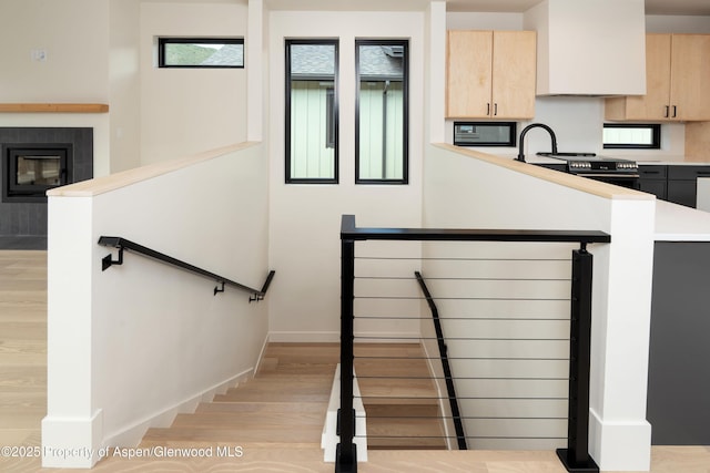 366 Stotts Mill Rd, Basalt, CO 81621 - staircase featuring wood finished floors and a fireplace