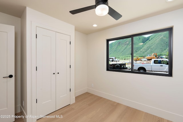 366 Stotts Mill Rd, Basalt, CO 81621 - unfurnished bedroom with light wood-style floors, a closet, recessed lighting, and ceiling fan