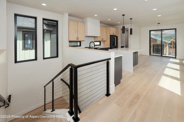 366 Stotts Mill Rd, Basalt, CO 81621 - kitchen with light brown cabinetry, light wood-style floors, light countertops, recessed lighting, and black appliances