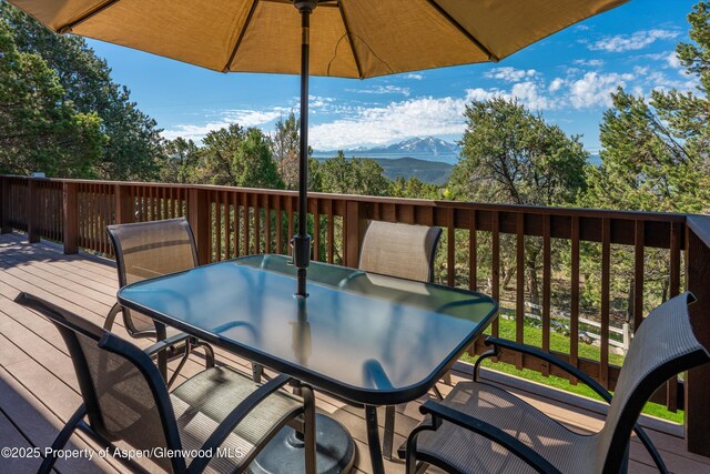 10 Cedar Cv, Glenwood Springs, CO 81601 - deck featuring outdoor dining space and a mountain view