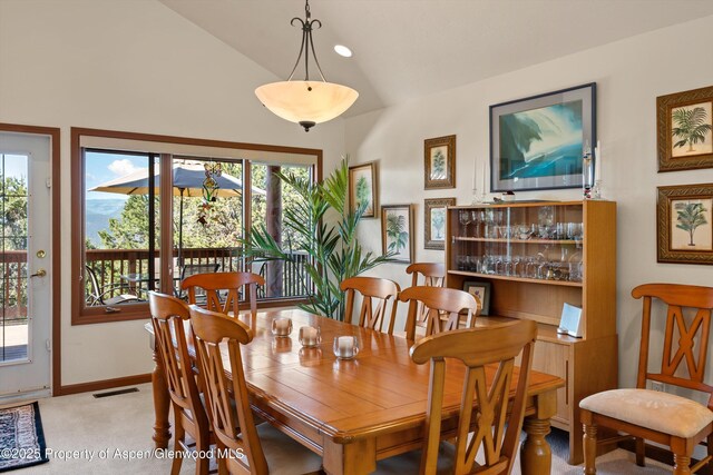 10 Cedar Cv, Glenwood Springs, CO 81601 - dining area featuring light colored carpet, high vaulted ceiling, and recessed lighting