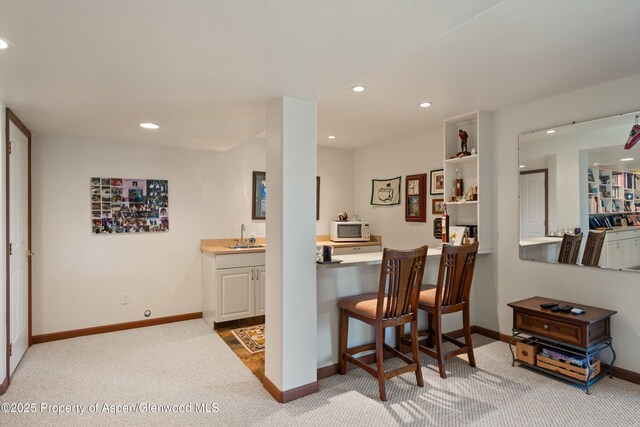 10 Cedar Cv, Glenwood Springs, CO 81601 - indoor wet bar featuring white microwave, carpet, and recessed lighting