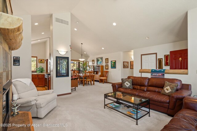 10 Cedar Cv, Glenwood Springs, CO 81601 - living room featuring light colored carpet, lofted ceiling, and recessed lighting