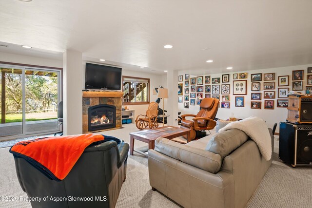 10 Cedar Cv, Glenwood Springs, CO 81601 - living area featuring carpet flooring, recessed lighting, a tiled fireplace, and healthy amount of natural light