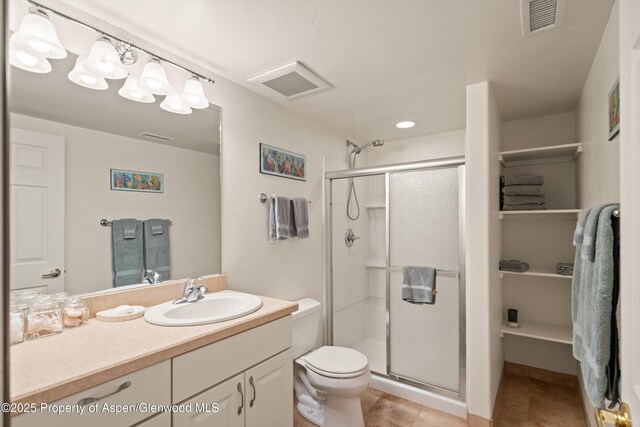 10 Cedar Cv, Glenwood Springs, CO 81601 - bathroom with a stall shower, tile patterned floors, and vanity