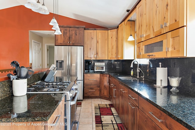 kitchen with pendant lighting, a sink, backsplash, light tile patterned flooring, and stainless steel gas range