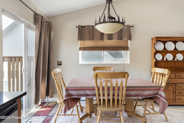 dining room featuring light tile patterned floors