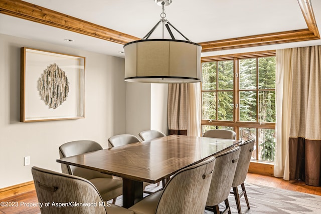 dining space featuring light wood-type flooring