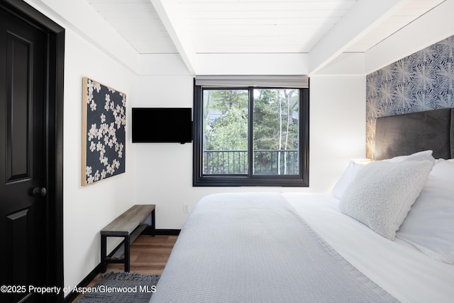 901 E Hyman Ave Unit 4, Aspen, CO 81611 - bedroom featuring wood finished floors, baseboards, and wood ceiling with exposed beams