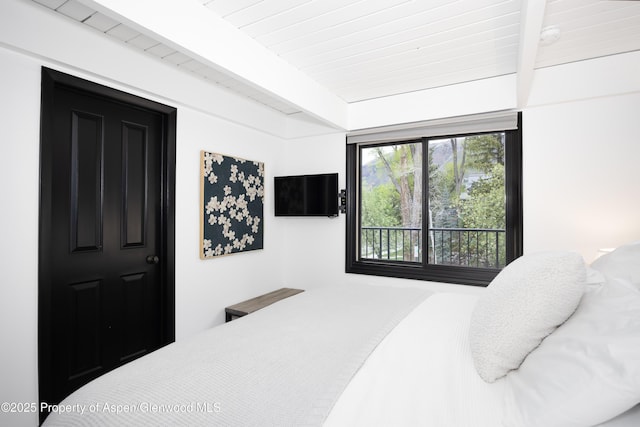 901 E Hyman Ave Unit 4, Aspen, CO 81611 - bedroom with wood ceiling with exposed beams