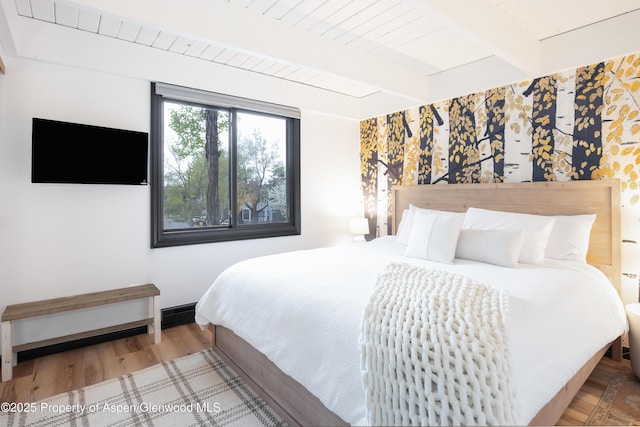 901 E Hyman Ave Unit 4, Aspen, CO 81611 - bedroom featuring wood finished floors and beam ceiling