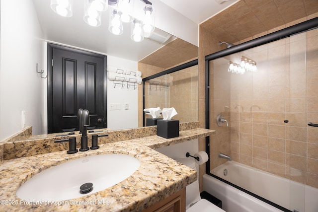 901 E Hyman Ave Unit 4, Aspen, CO 81611 - full bathroom featuring combined bath / shower with glass door, vanity, and toilet