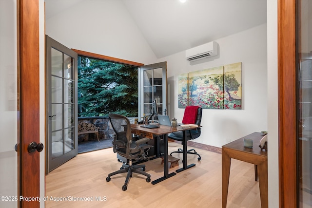 1185 Heritage Dr, Carbondale, CO 81623 - office space featuring an AC wall unit, wood finished floors, and high vaulted ceiling