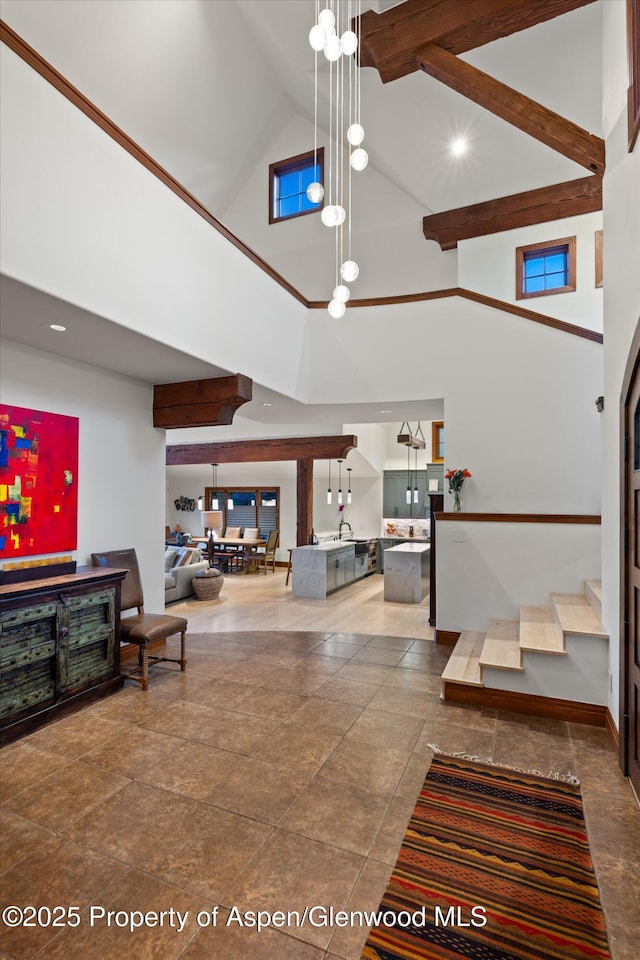 1185 Heritage Dr, Carbondale, CO 81623 - foyer with high vaulted ceiling and stairway