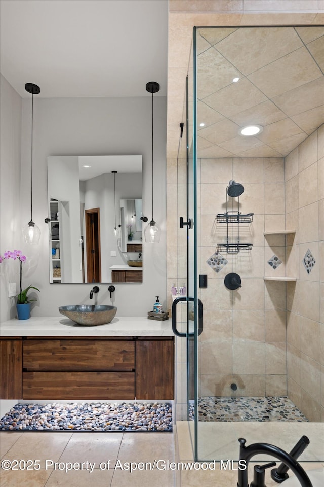 1185 Heritage Dr, Carbondale, CO 81623 - bathroom with a shower stall, vanity, and recessed lighting
