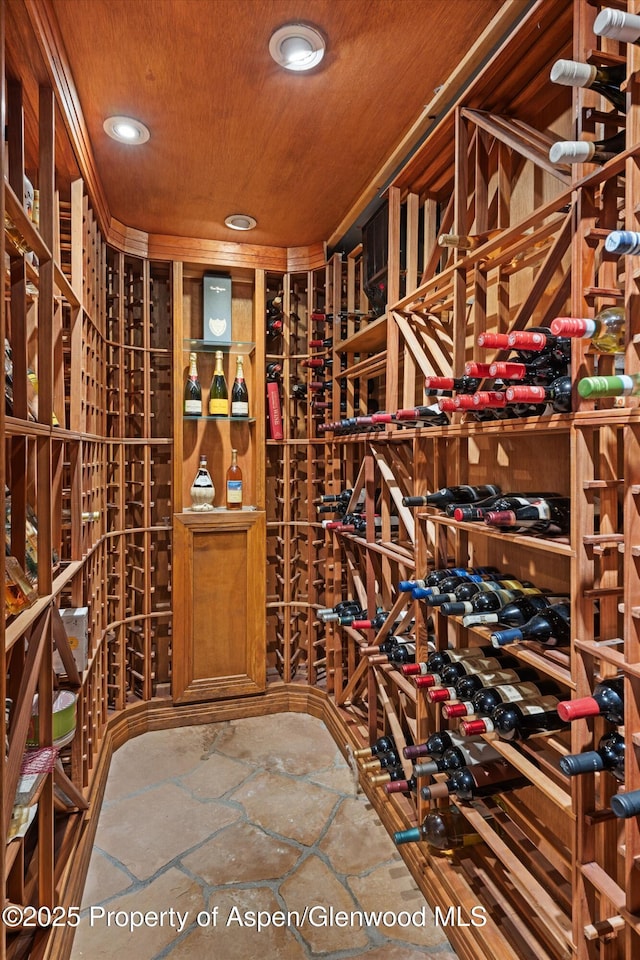 1185 Heritage Dr, Carbondale, CO 81623 - wine cellar featuring stone tile floors and recessed lighting
