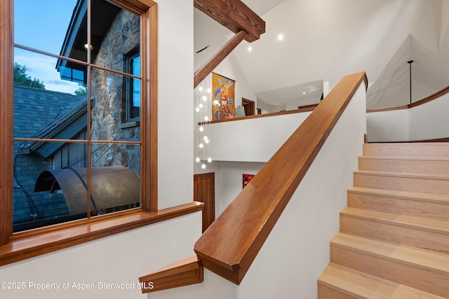 1185 Heritage Dr, Carbondale, CO 81623 - stairway with beam ceiling and high vaulted ceiling