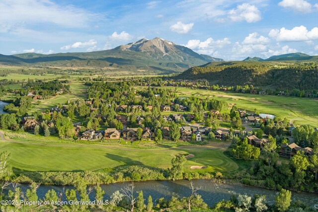 1185 Heritage Dr, Carbondale, CO 81623 - mountain view featuring a golf club, a large body of water, and nearby suburban area