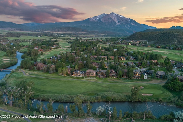1185 Heritage Dr, Carbondale, CO 81623 - view of mountain backdrop featuring a golf course and a nearby body of water