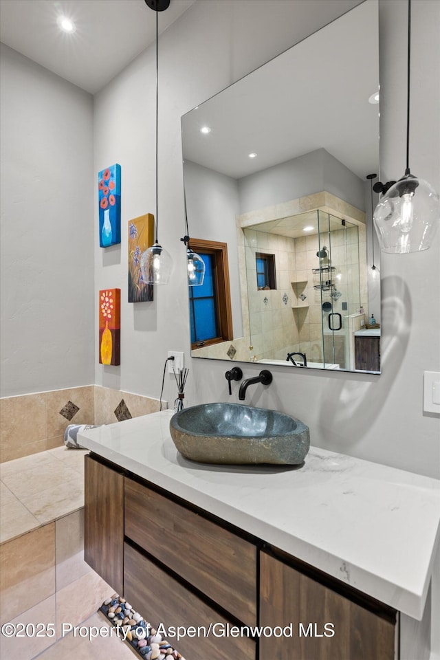 1185 Heritage Dr, Carbondale, CO 81623 - bathroom with vanity, a shower stall, recessed lighting, and tile patterned flooring