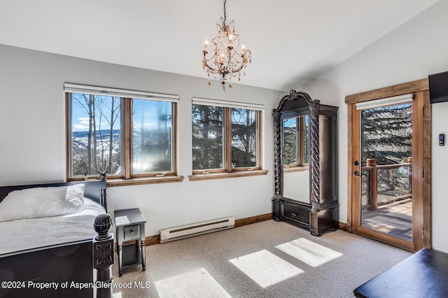 carpeted bedroom featuring a mountain view, a baseboard radiator, lofted ceiling, and an inviting chandelier