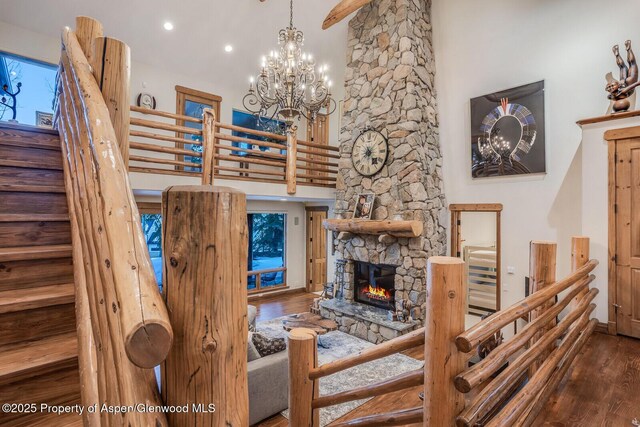 kitchen with pendant lighting, wooden ceiling, high vaulted ceiling, sink, and beamed ceiling