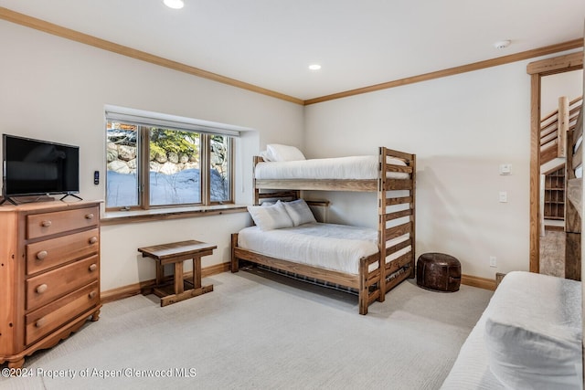 carpeted bedroom with crown molding