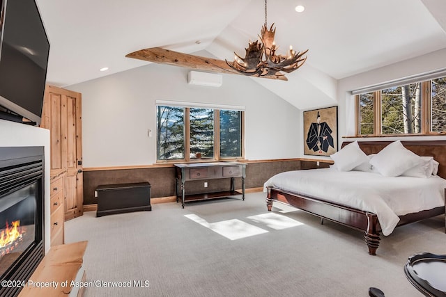 carpeted bedroom with a wall mounted air conditioner, vaulted ceiling with beams, and a notable chandelier