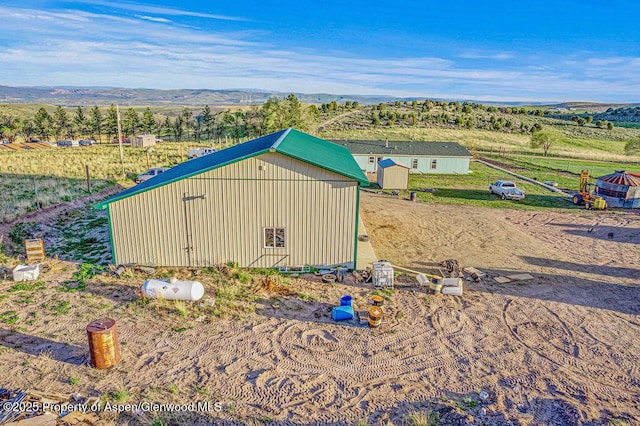 4050 County Road 7, Craig, CO 81625 - view of pole building with a view of countryside and a mountain view