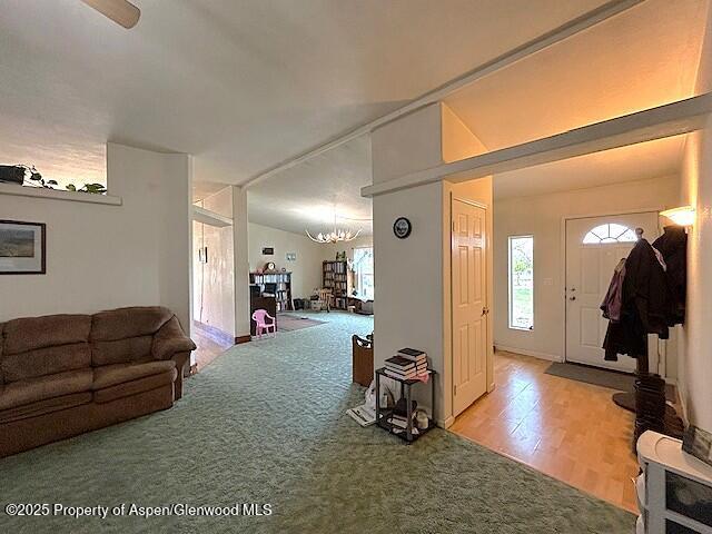 4050 County Road 7, Craig, CO 81625 - carpeted foyer featuring a chandelier