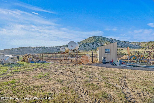 4050 County Road 7, Craig, CO 81625 - view of yard featuring an outbuilding, fence, and a mountain view
