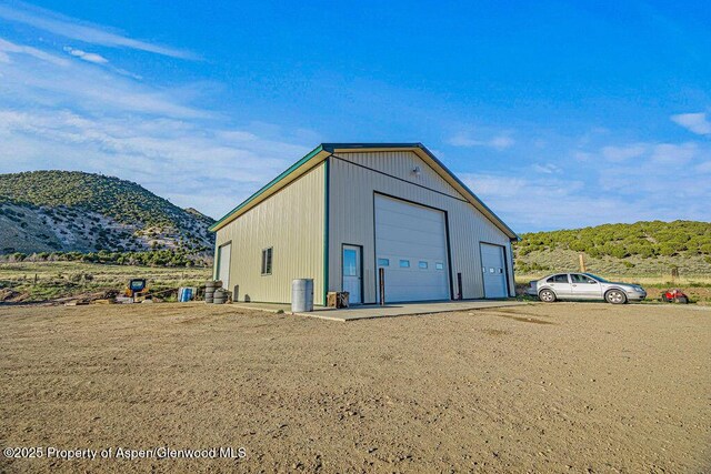 4050 County Road 7, Craig, CO 81625 - view of outdoor structure featuring an outbuilding and a mountain view