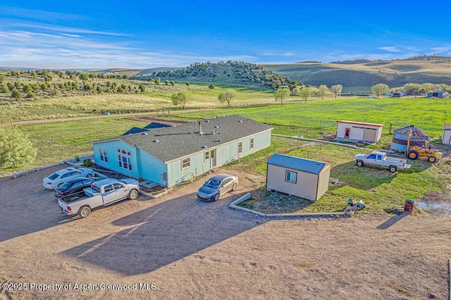 4050 County Road 7, Craig, CO 81625 - aerial view of sparsely populated area with a mountainous background