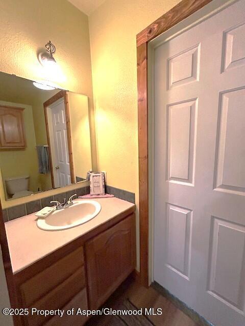 4050 County Road 7, Craig, CO 81625 - bathroom featuring vanity and toilet