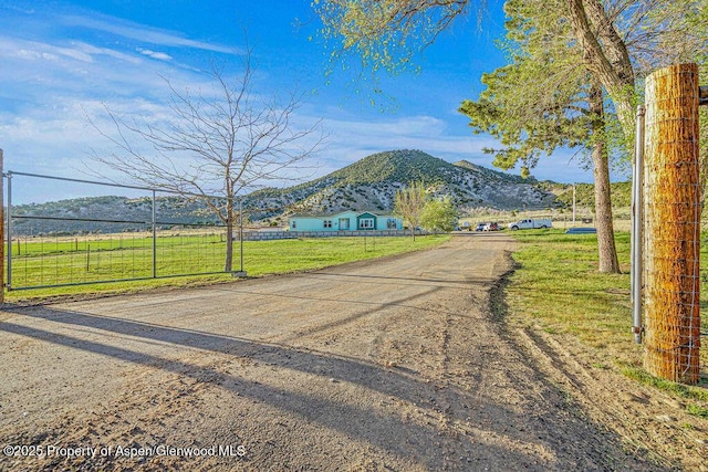 4050 County Road 7, Craig, CO 81625 - view of front facade with a mountain view and driveway