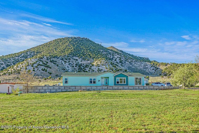 4050 County Road 7, Craig, CO 81625 - view of front facade featuring a mountain view and a front yard