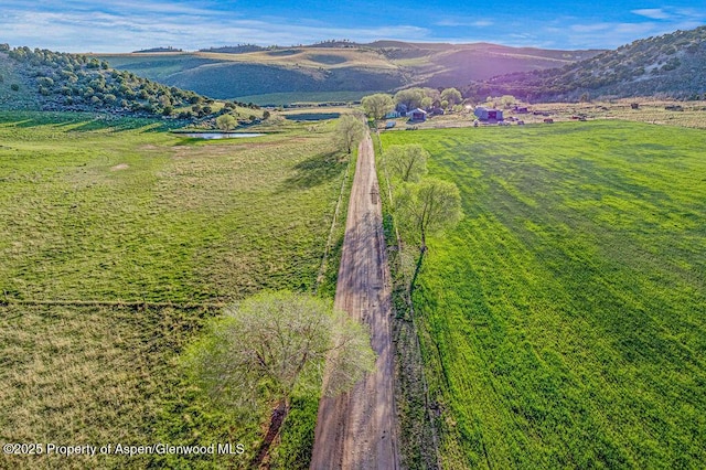4050 County Road 7, Craig, CO 81625 - aerial view of sparsely populated area with a mountain backdrop