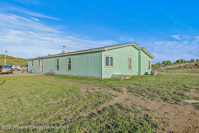 4050 County Road 7, Craig, CO 81625 - view of side of property featuring a yard