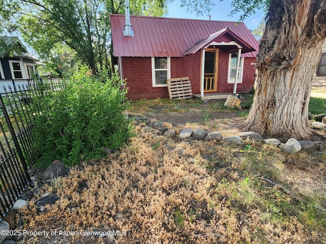 1004 Elm Ave, Collbran, CO 81624 - chalet / cabin featuring metal roof