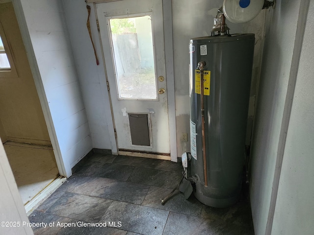 1004 Elm Ave, Collbran, CO 81624 - utility room with water heater